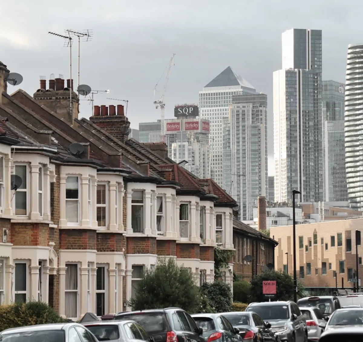Residential london houses against canary whaft backdrop