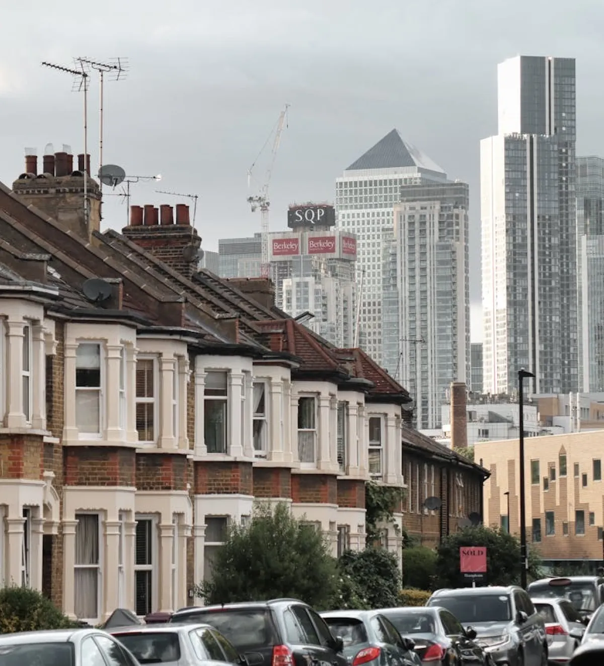 Residential london houses against canary whaft backdrop